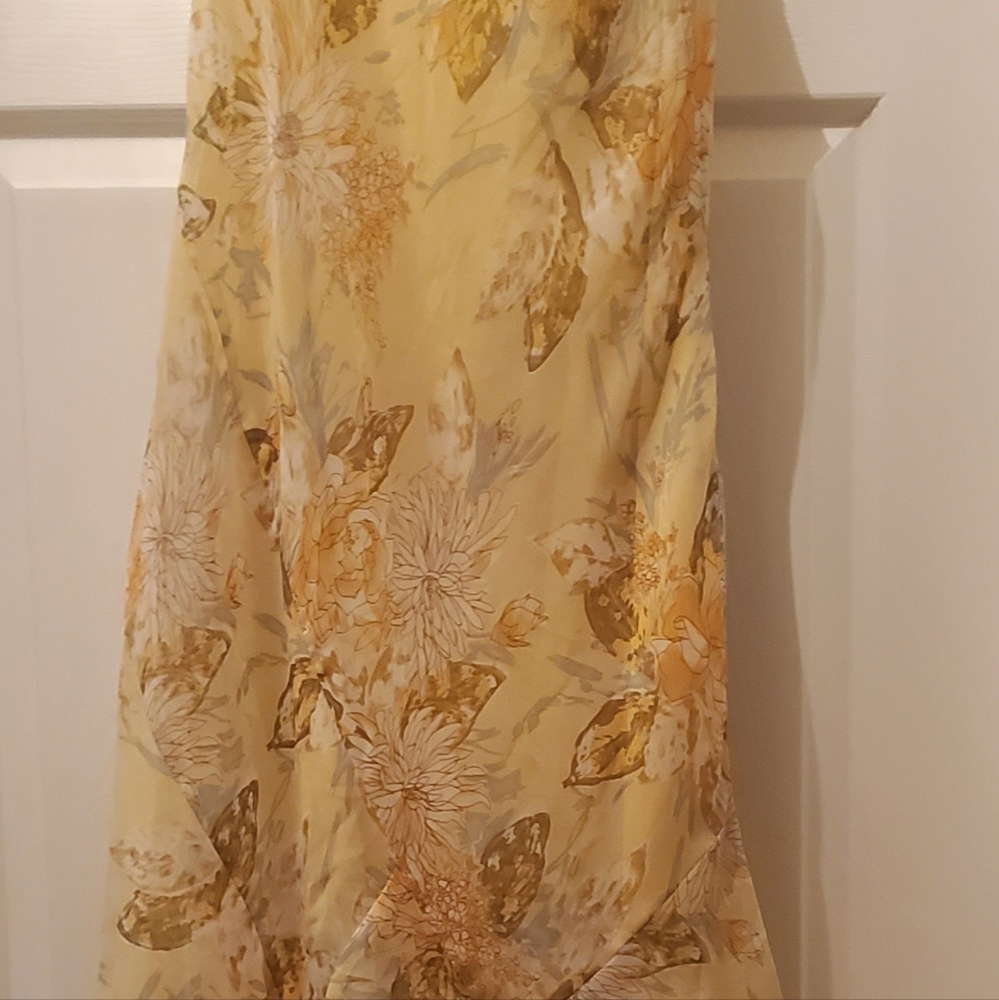 Dress barn, size 12, floral yellow. Dress can be worn from day into evening.